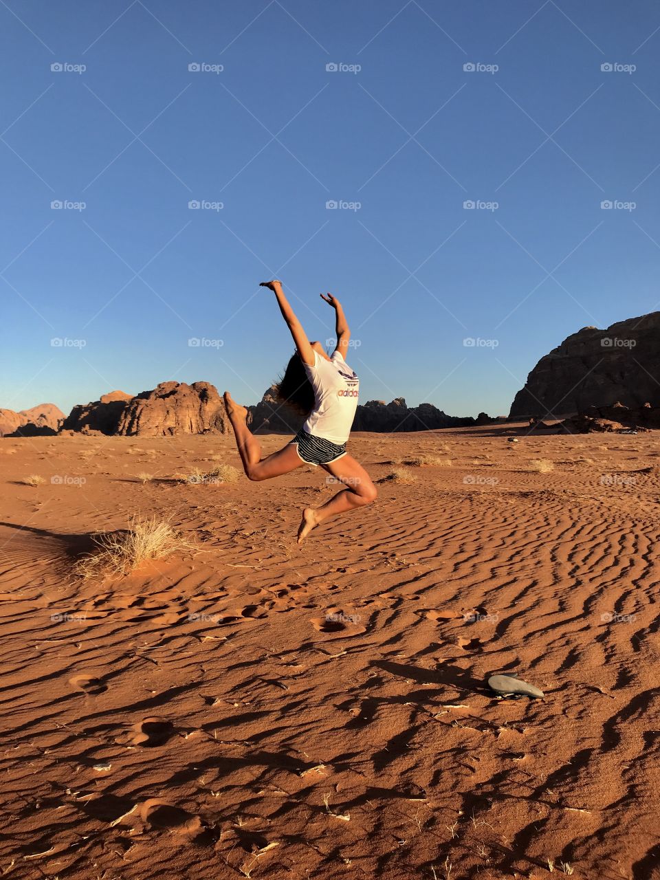 Wadi rum desert. Sunset. Jump. Jordan