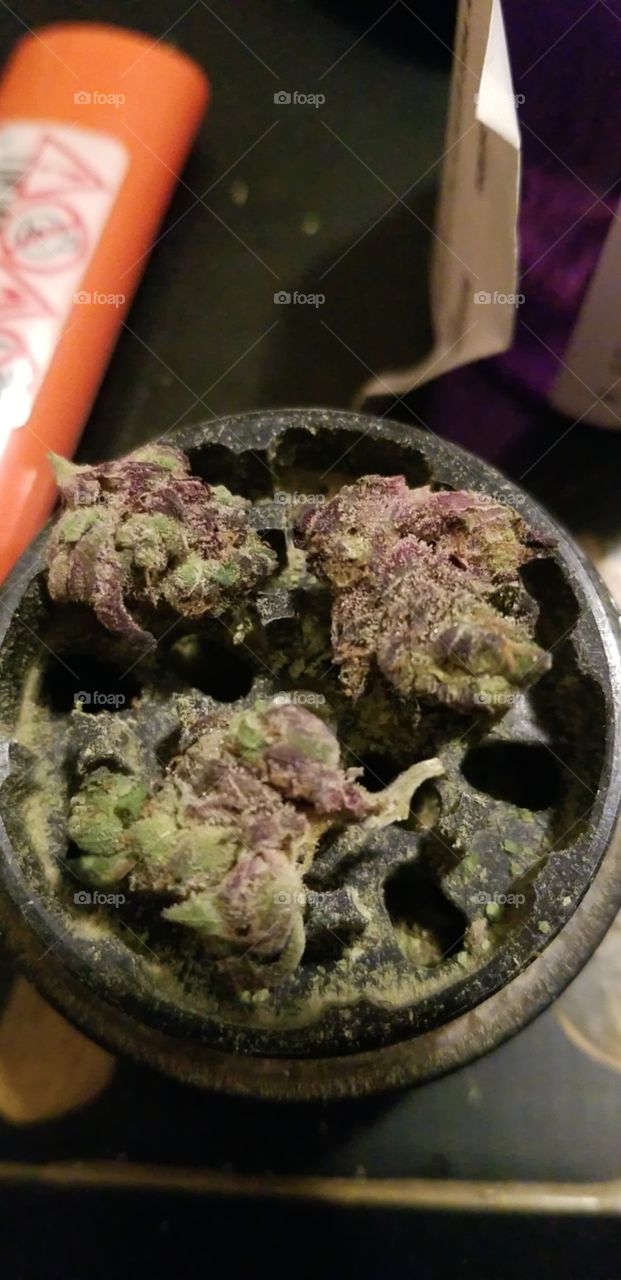 some more purple medical nugs about to be ground