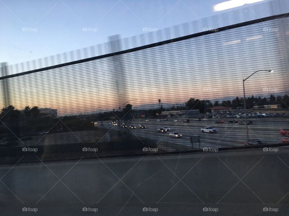 Sunrise over freeway.