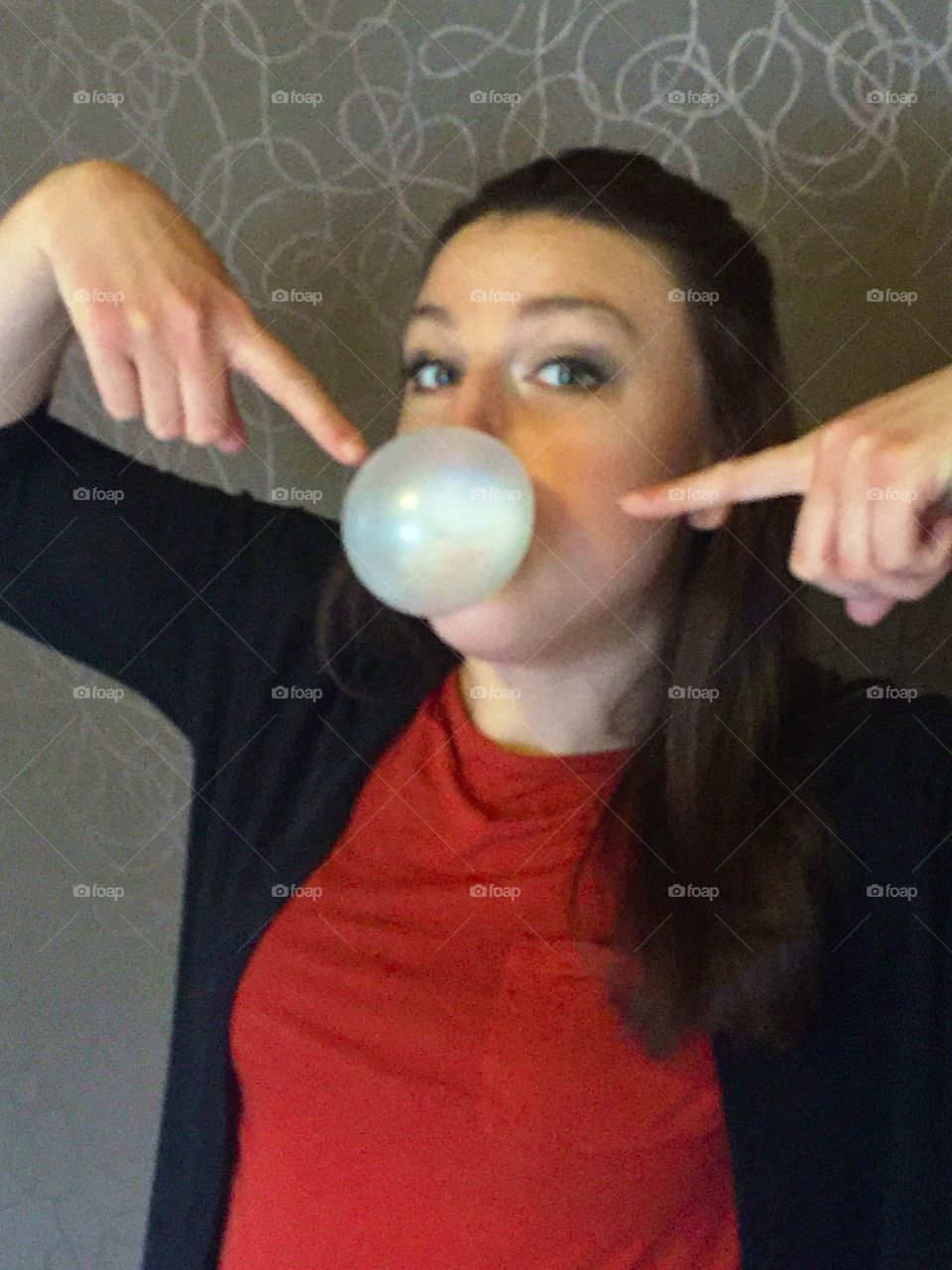 Blowing bubblegum! 