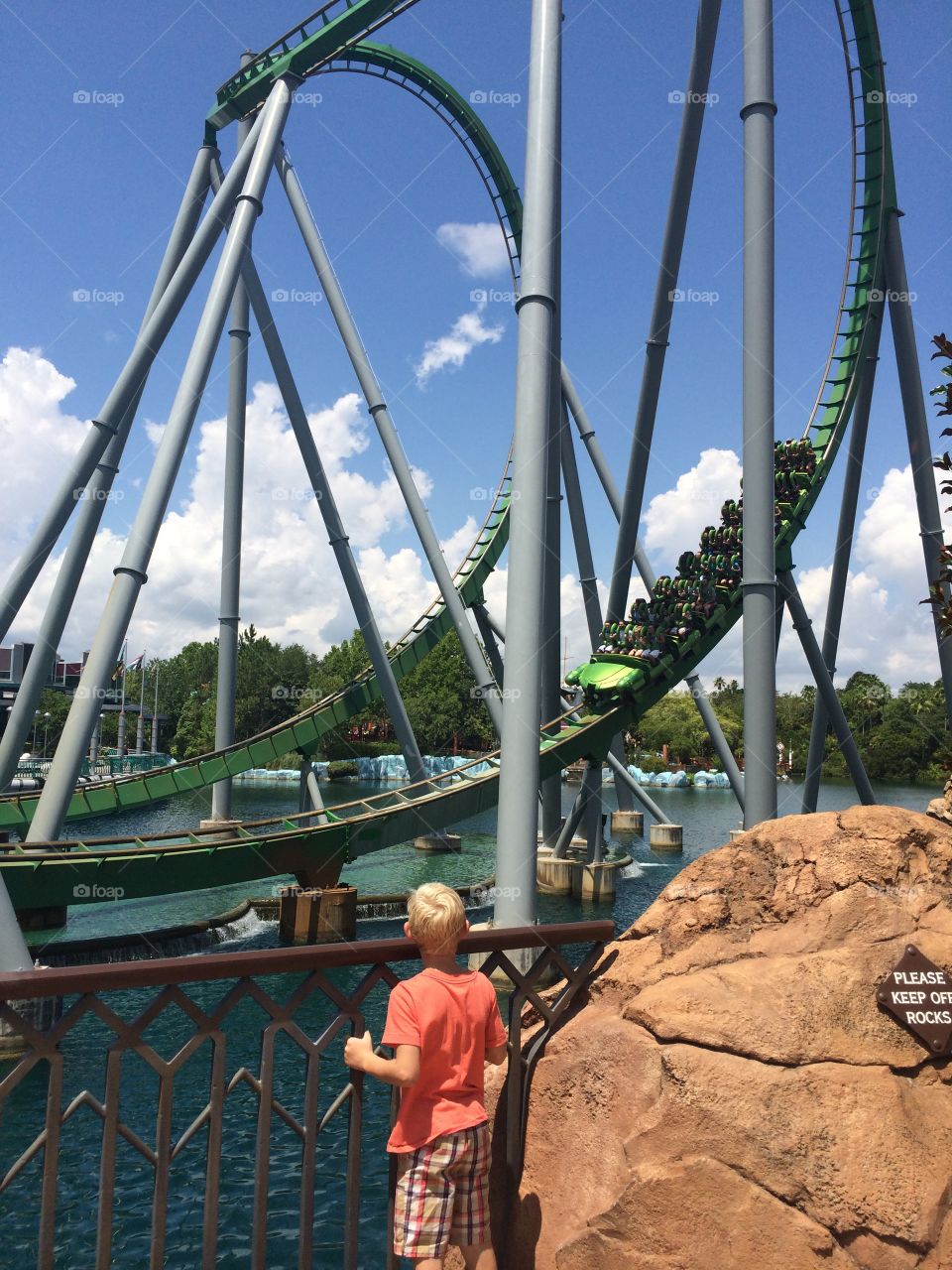 Waiting. Can't wait until he is big enough to ride roller coasters 