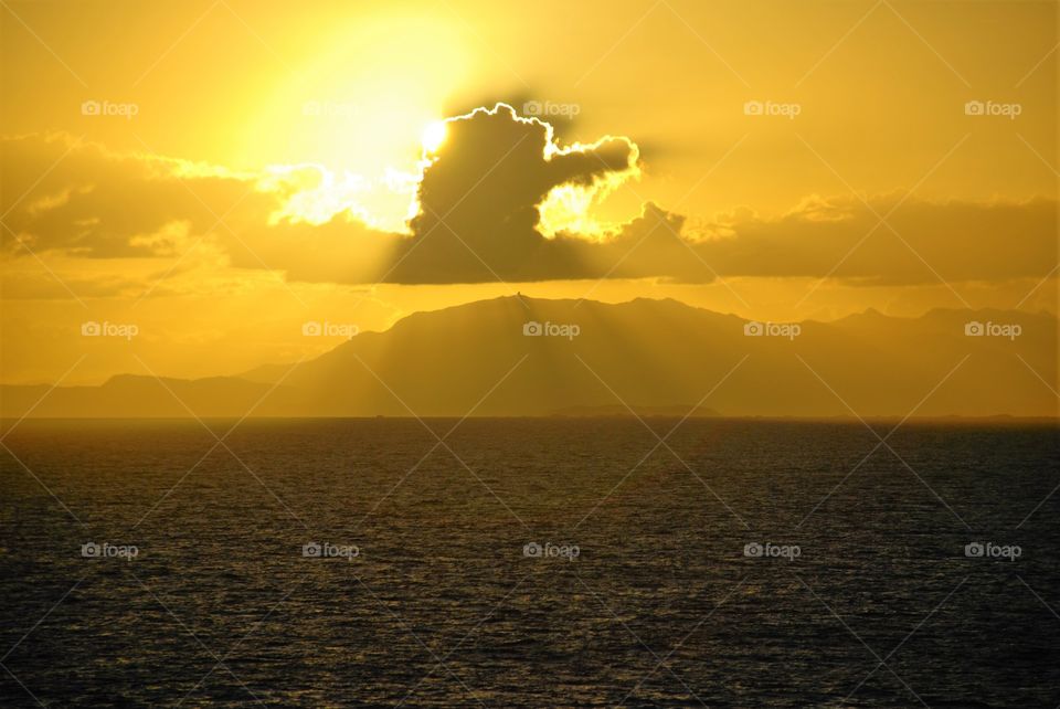 Scenic view of idyllic sea at sunset