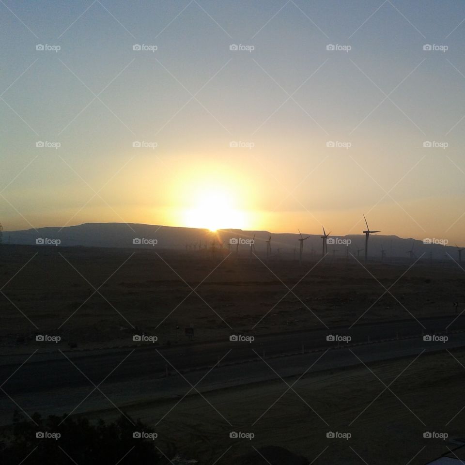 Sunset and windmills on Za'farana Road, Ain Sokhna , Egypt