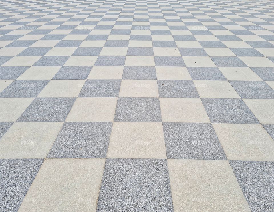 checkered floor of the terrace overlooking the sea of ​​Livorno (Tuscany)