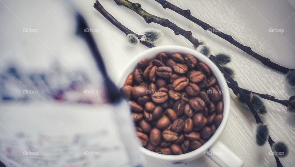 coffee beans in a cup