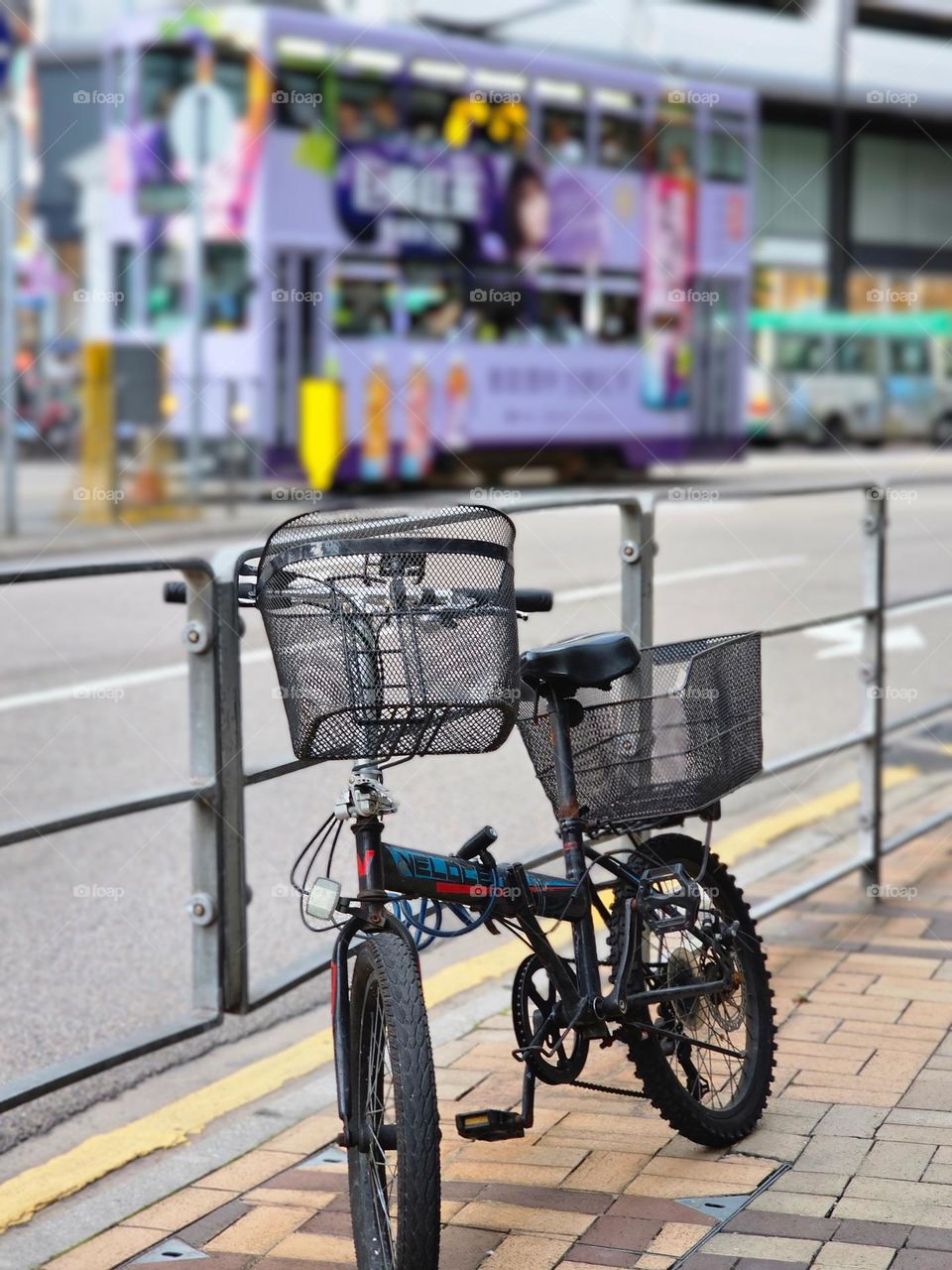 One lonely bicycle parked on the street