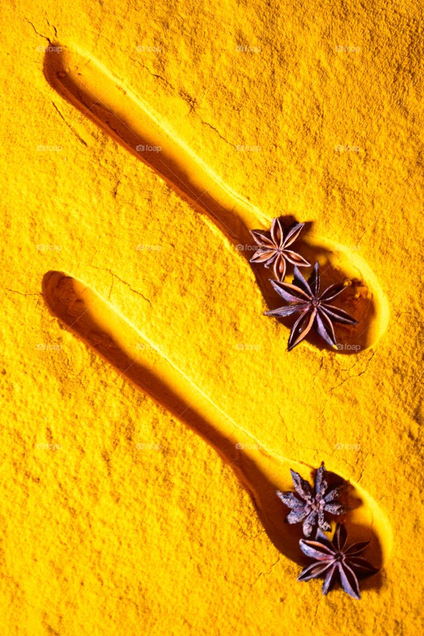 Star anise in turmeric powder