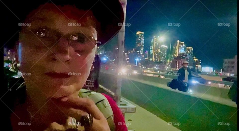 Coming home to “Newtown Creek” in LIC I am once again crossing the “Pulaski Bridge”, this time at night and all around me there are sparkling magnificent lights as well as people who await the reopening of the bridge. 2022. Hypnotic Productions