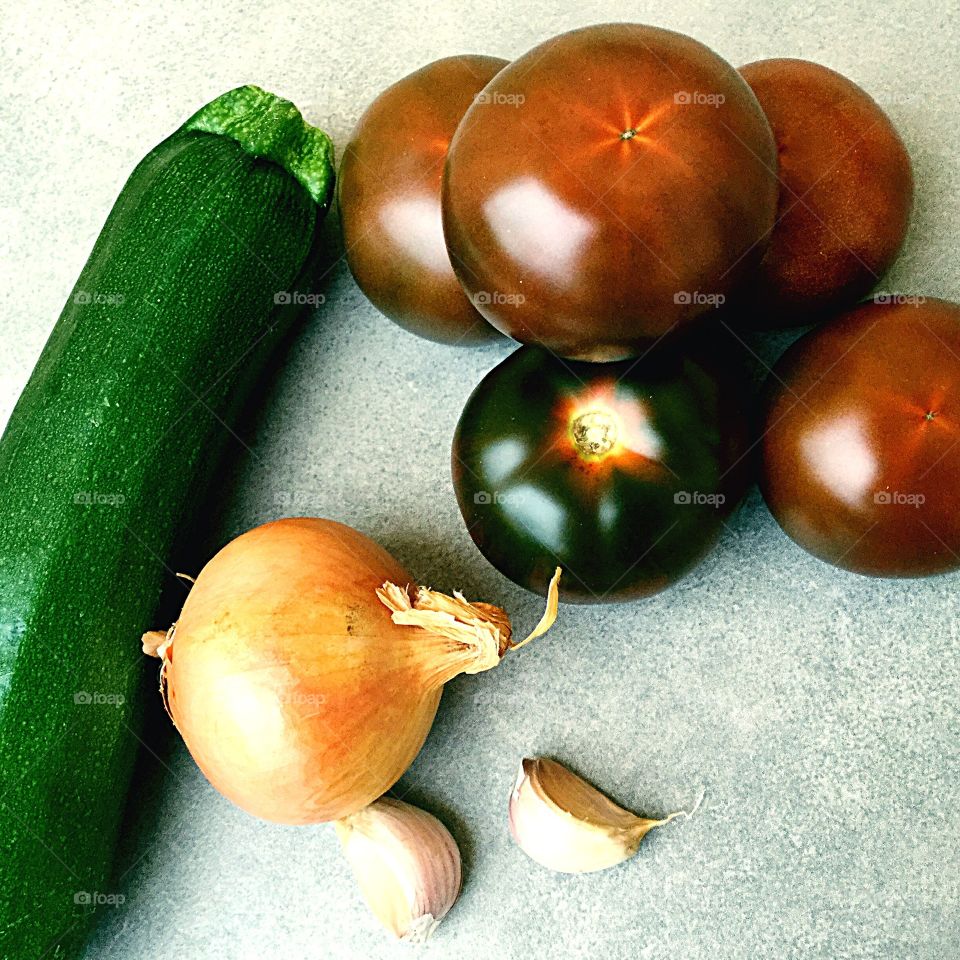 Tomatoes Brown Zucchini Green Onion Garlic 