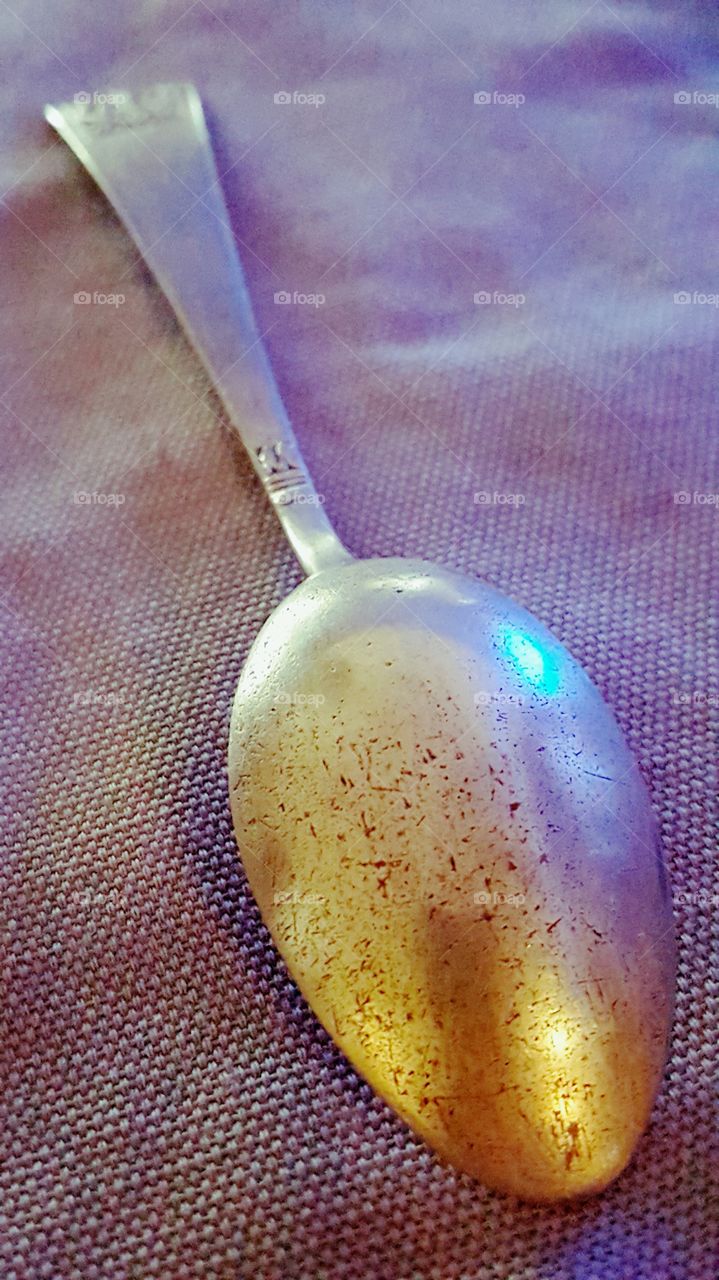 Old silver spoon.