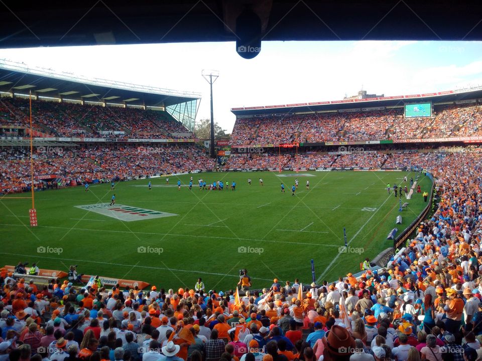 Sporting event, packed stadium in central South Africa.