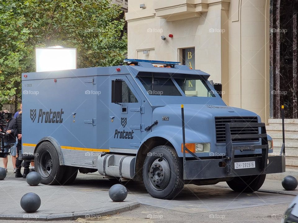 Blue armored vehicle for transportation of valuables