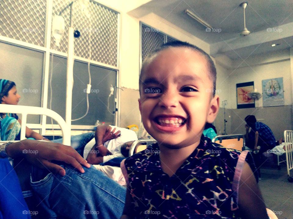 The child recruited in the hospital is laughing