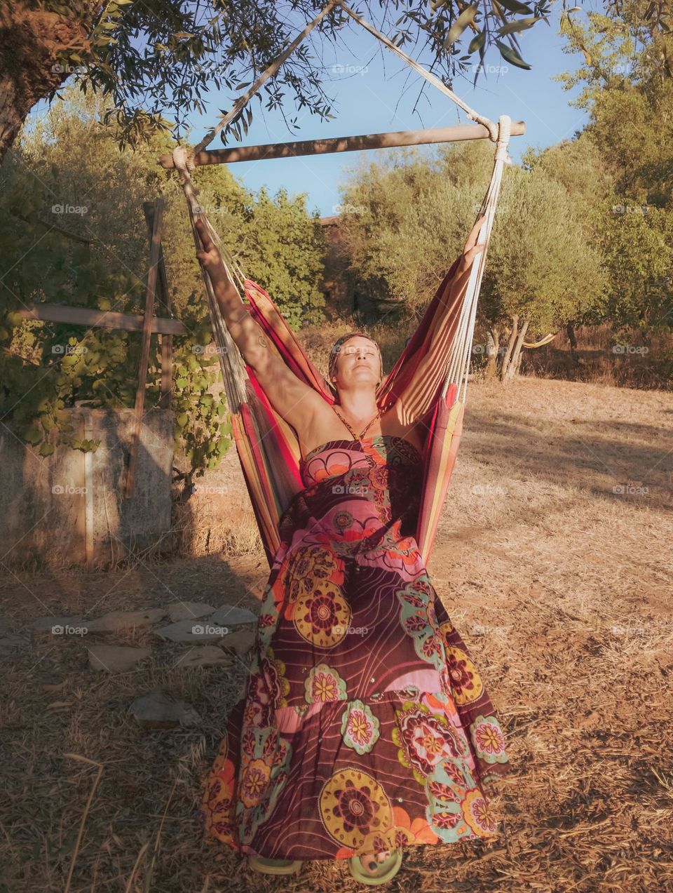 When it’s so hot that all you can do is put on a colourful floaty dress and swing gentle in a hammock chair