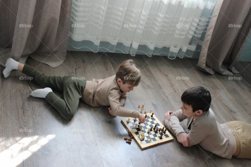 children play chess