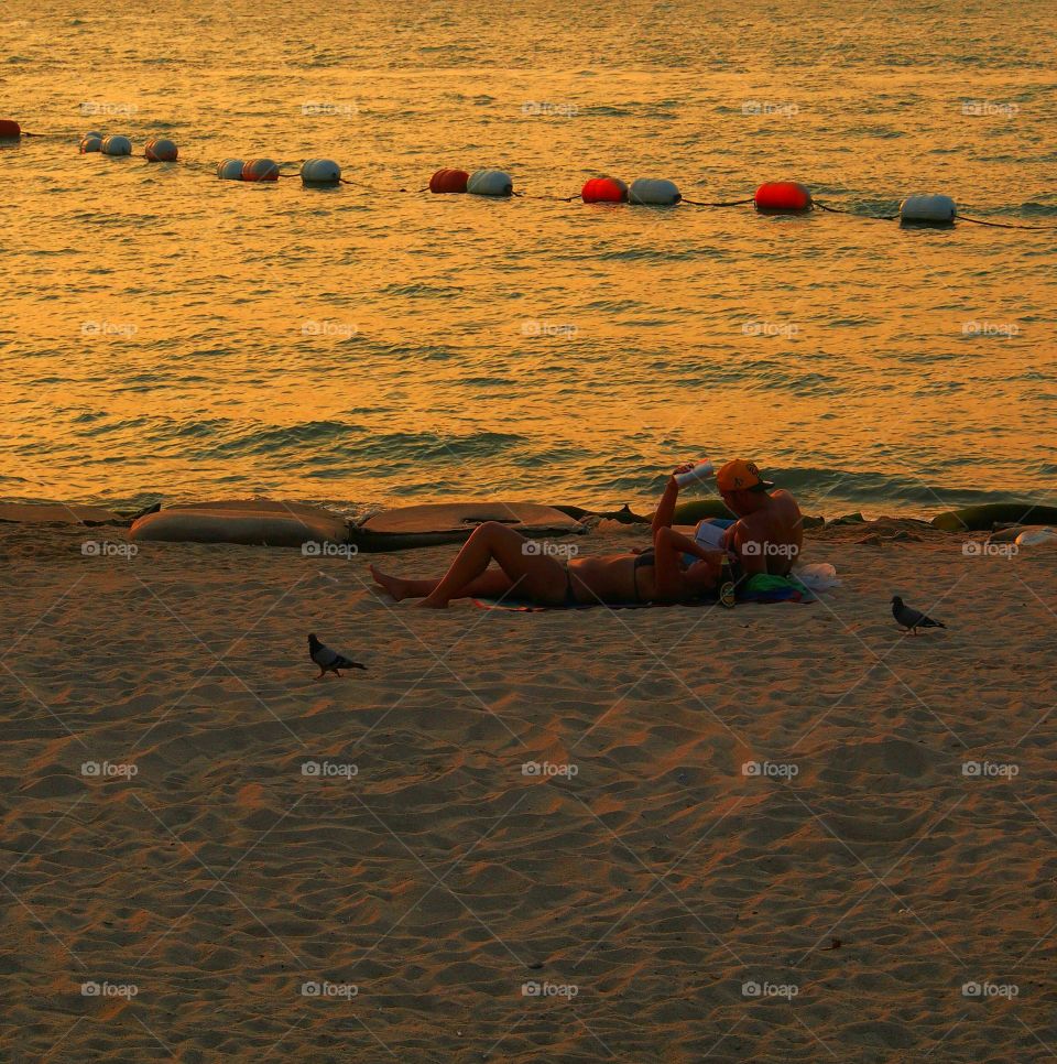 Relax on the beach during sunset