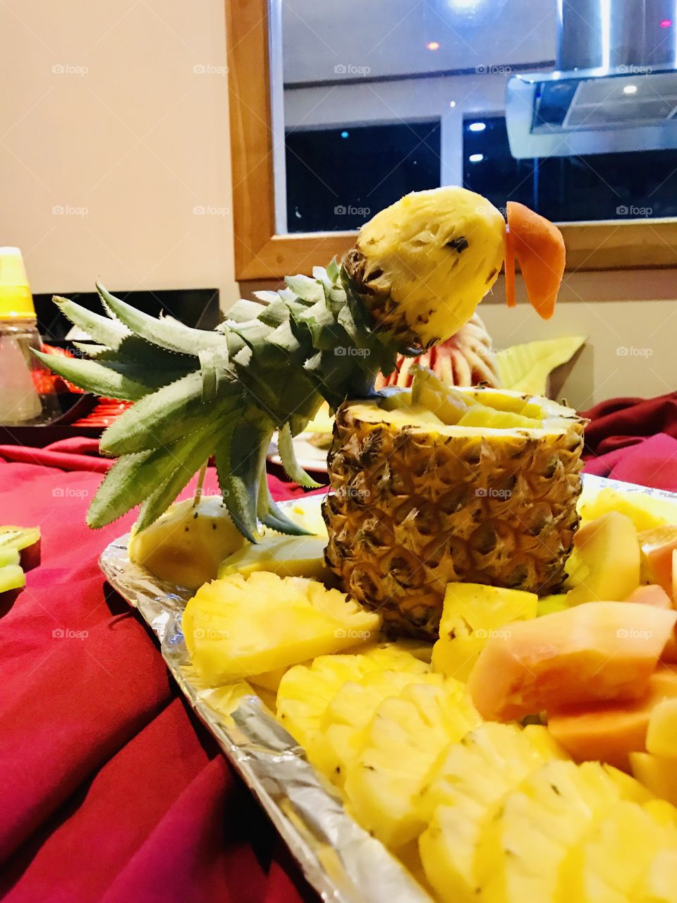 A parrot made from a pineapple
