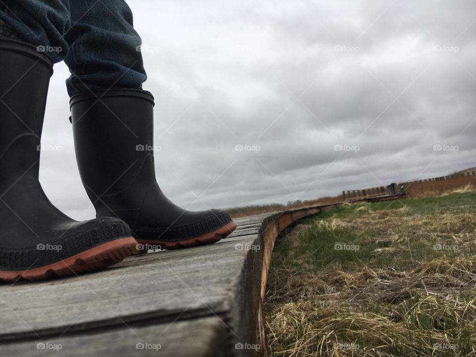 Boots on a boardwalk