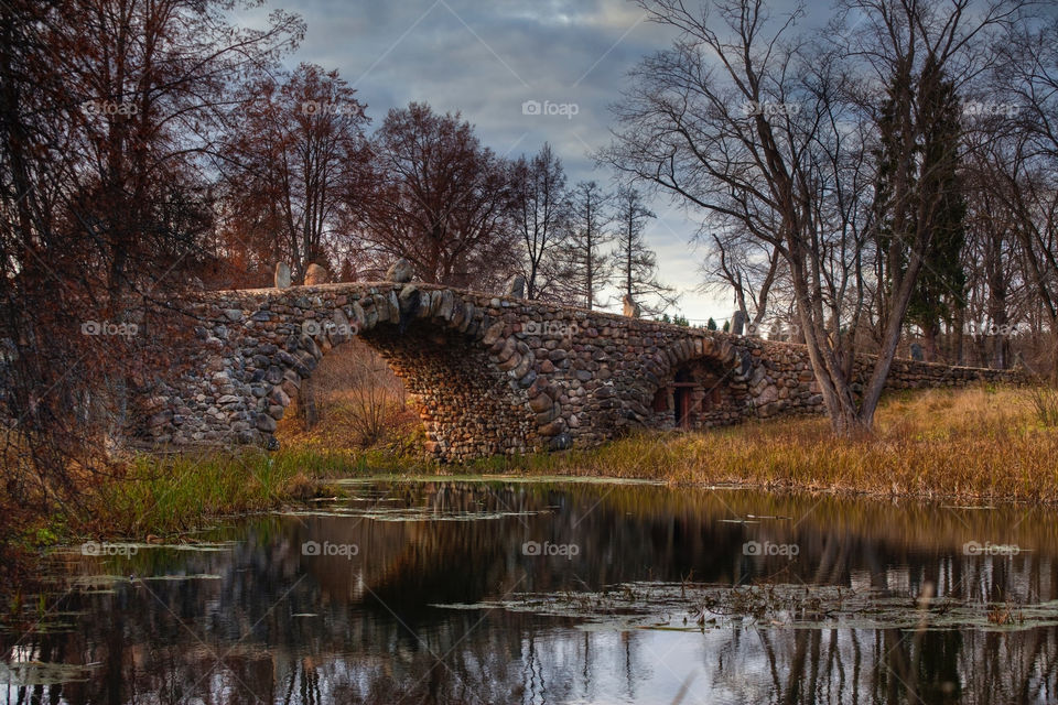 Stone bridge in manor at autumn, Torzhok, Russia