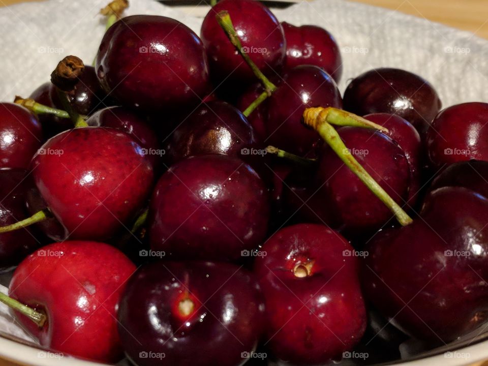 enjoying delicious cherries