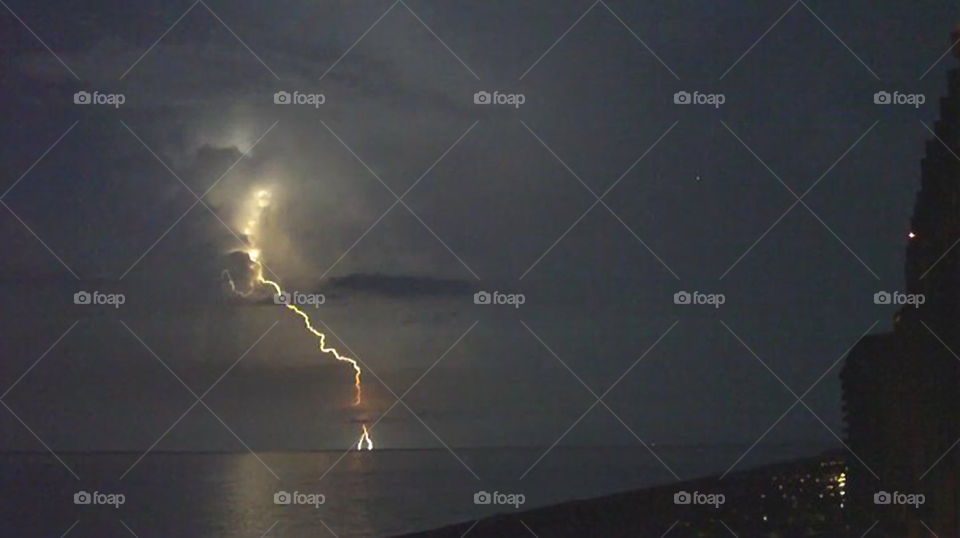 Thunderstorm in Orange Beach. Nighttime thunderstorm in Orange Beach Alabama.