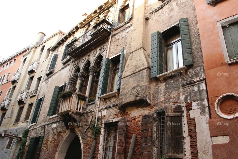 Venice street view . A view looking up at historic houses in Venice 