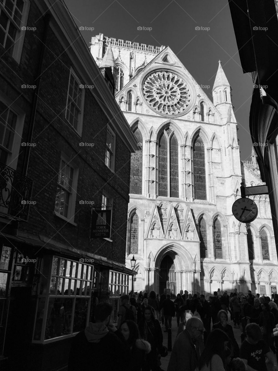 York Minster in B&W ... I love how a face is lit up in the sunlight and of course the beautiful masonry work onthe Minster 