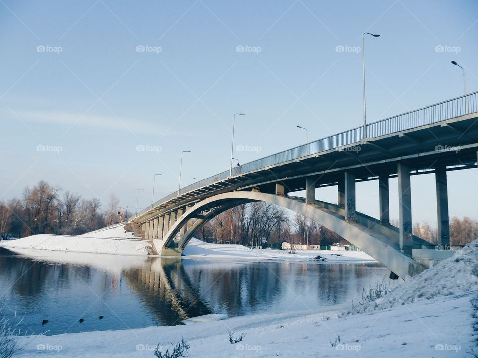 reflection of the bridge in river Dnepr