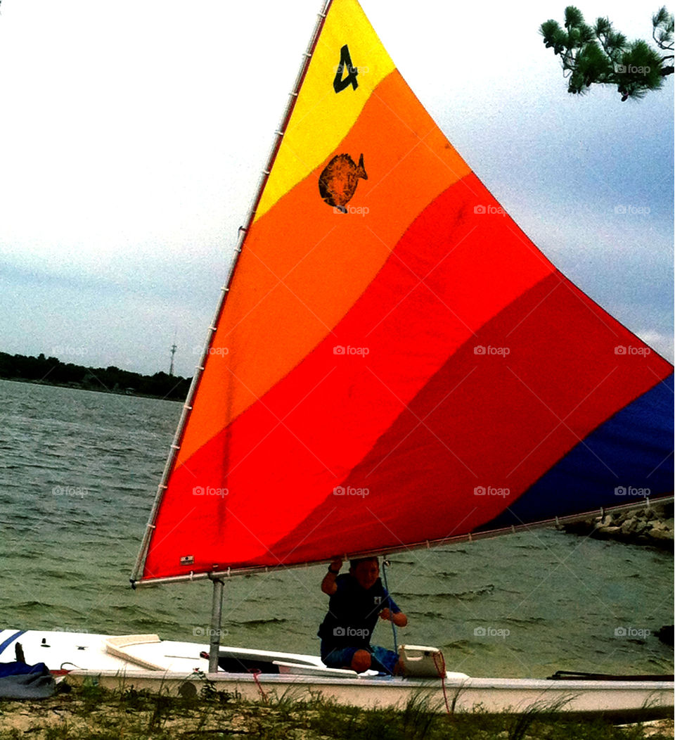 Young boaters. Children learning to sail