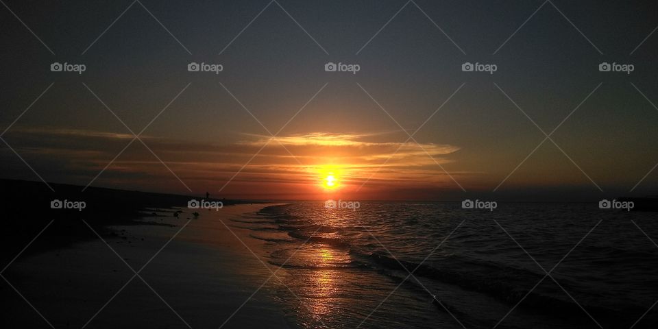 Sunset in Teringai Beach