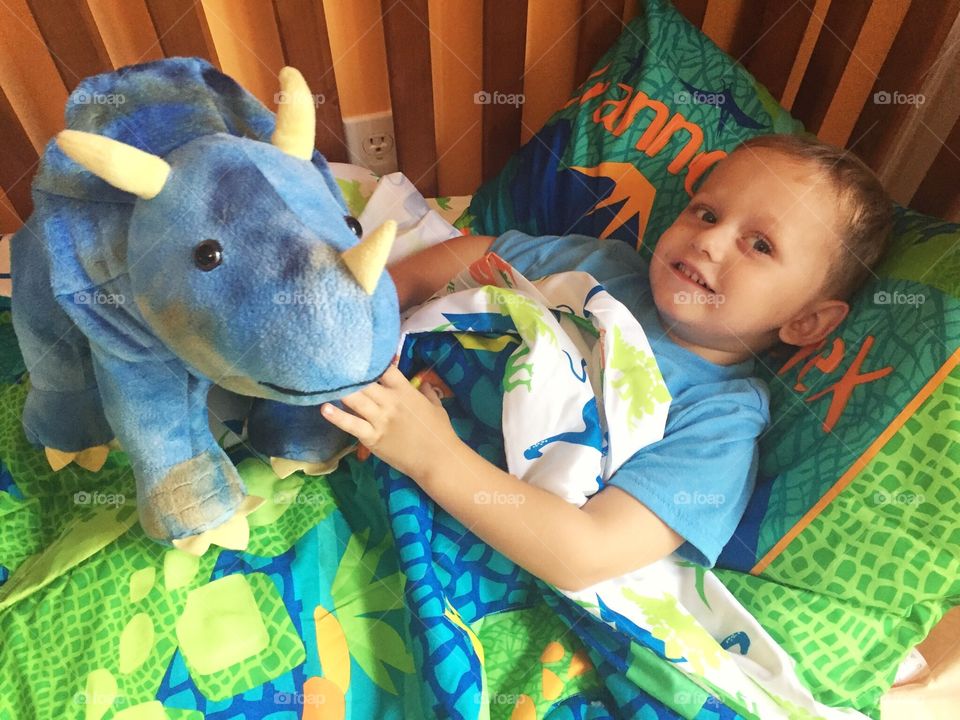 My little man in his new big boy bed. 