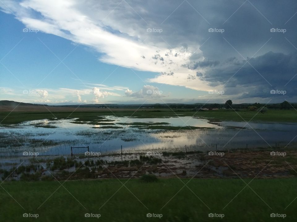 Storms Brewing over a Marsh