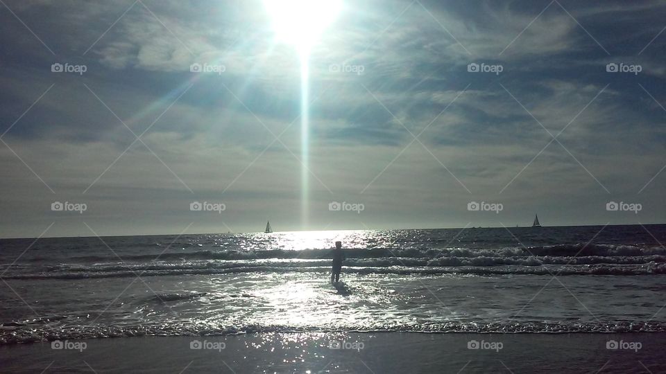 Sunbeam Greets the Ocean