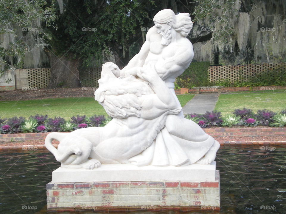 man vs lion. sculpture garden 