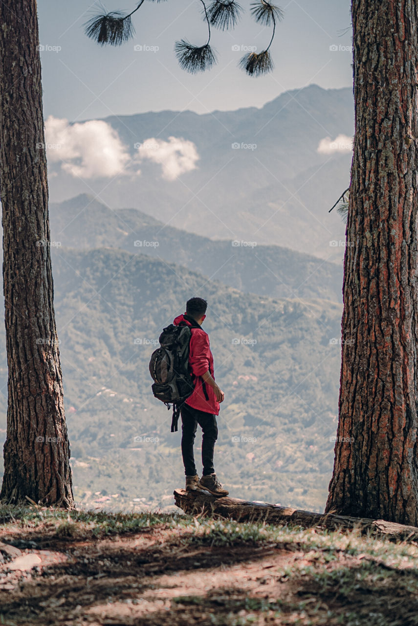 Boy enjoying nature on the mountain