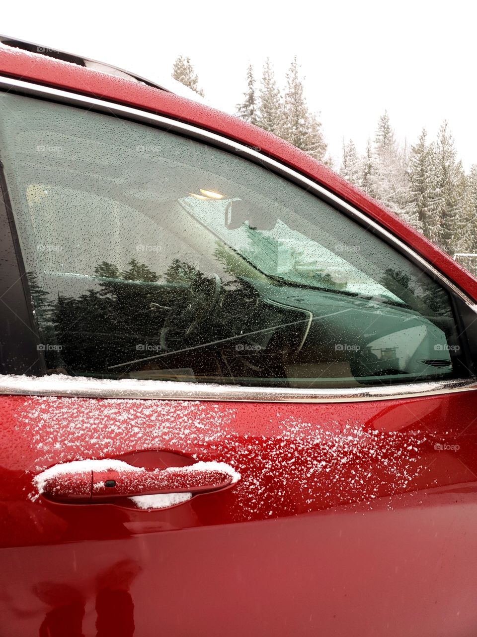 red car in snow