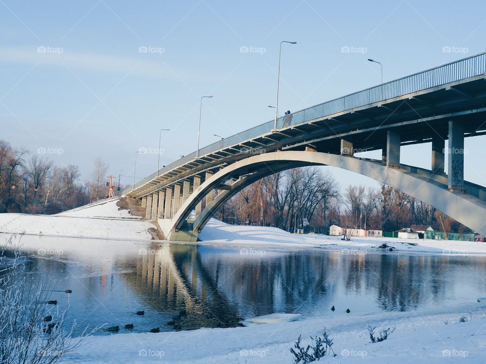 reflection of the bridge in dnieper River