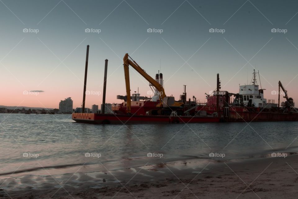 Dredging Ship at Sunset