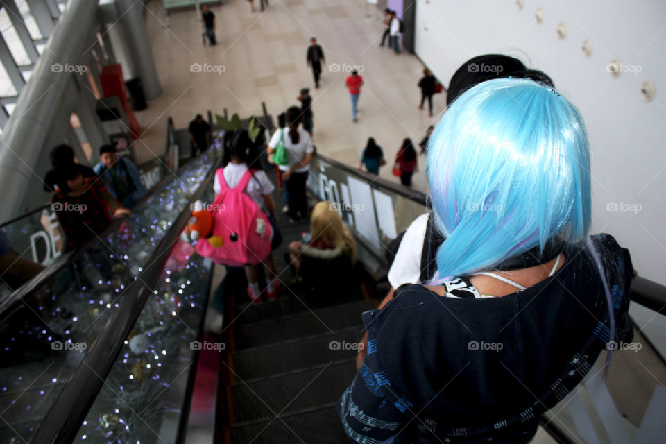cosplayer at the escalator