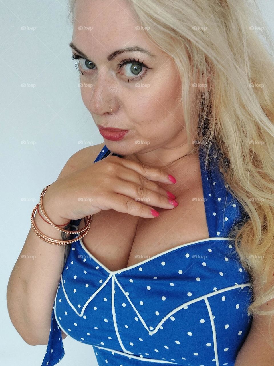 blond woman wearing bracelets