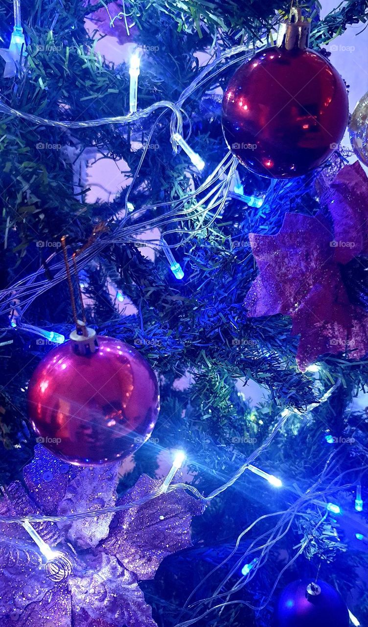 beautiful magenta color, glitter and sparkle on Christmas adorned the tree