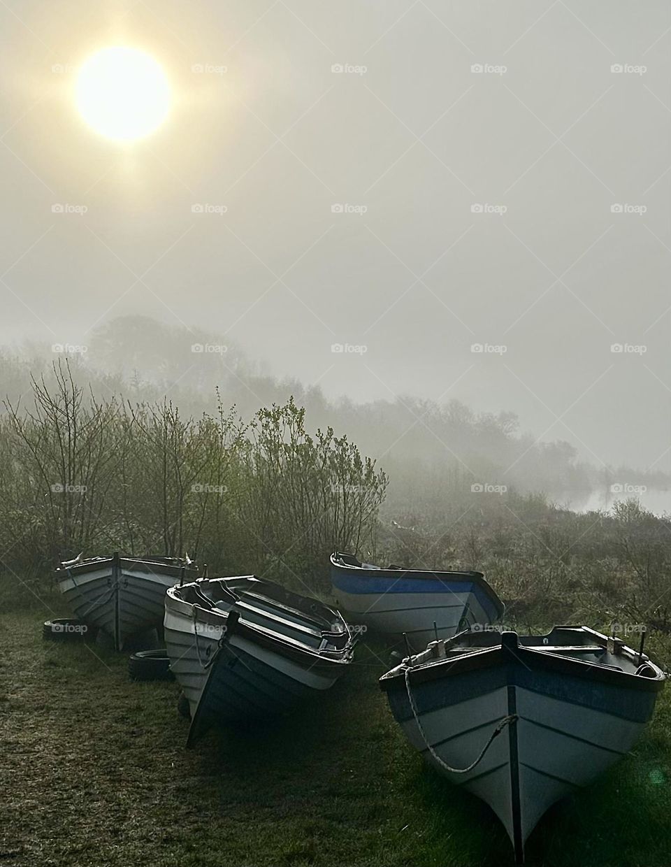 Boats in the mist Co Mayo Ireland