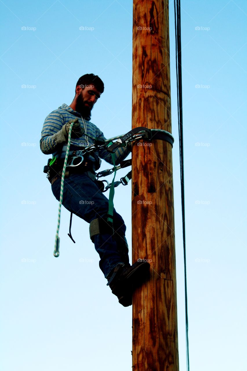 Line worker . Climbing 