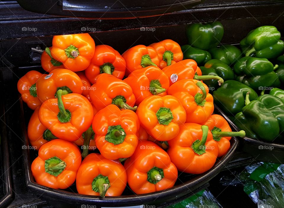 Orange and green peppers.