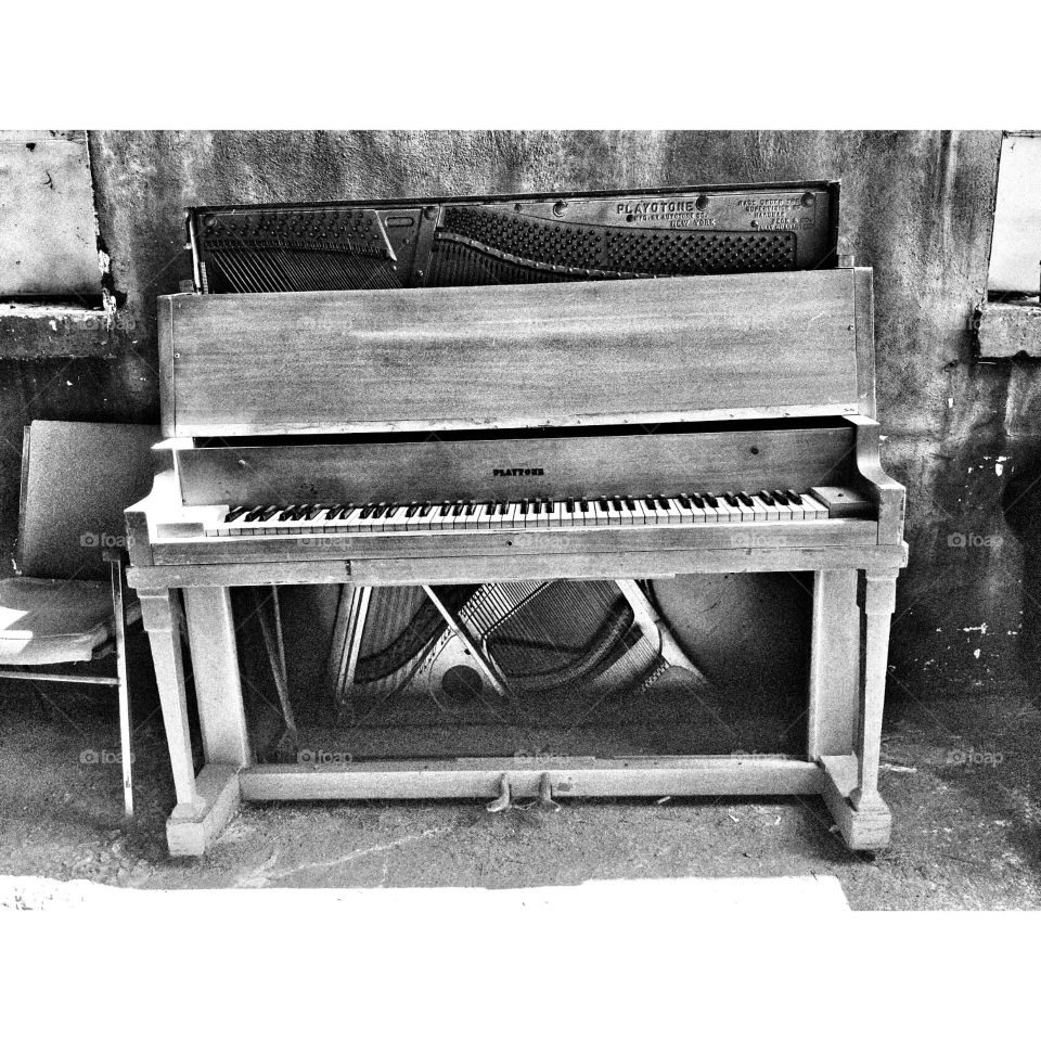 classical. old piano at thrift shop