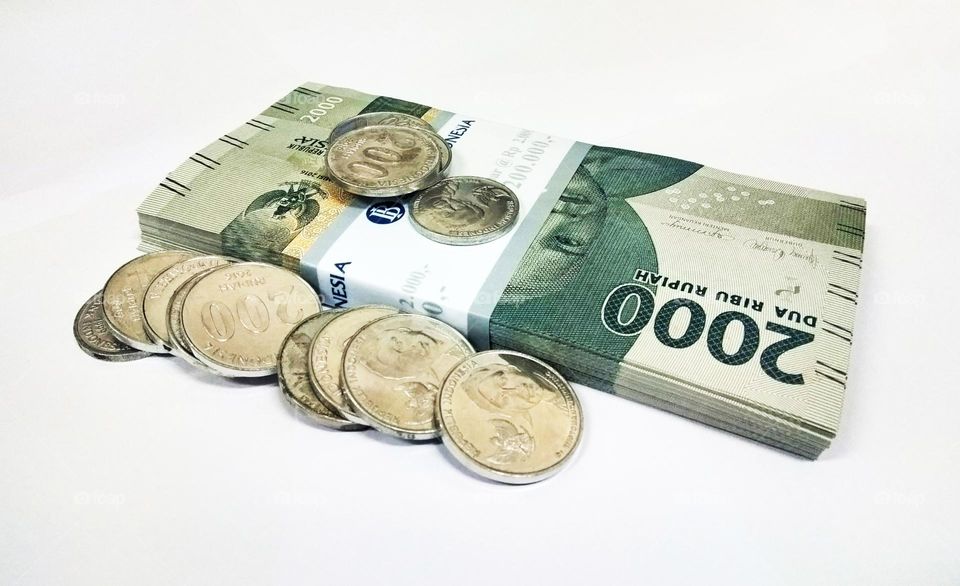 Photo of money on a white background, money is a medium of exchange and for doing business
