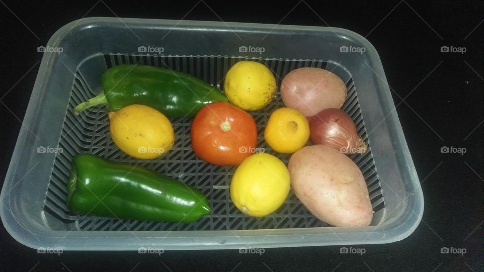 wide variety of vegetables and lemon.