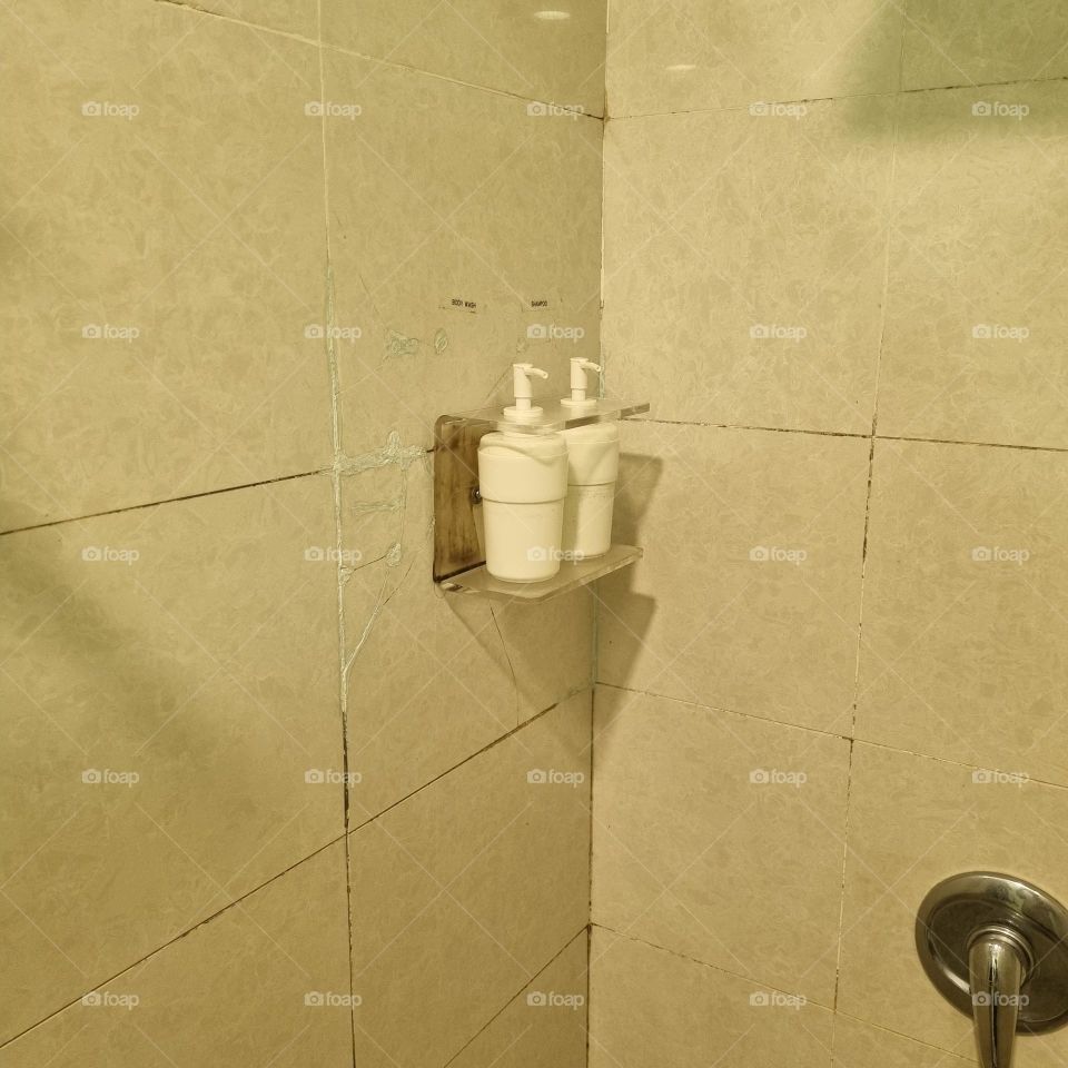 Repaired tile at club's bathroom