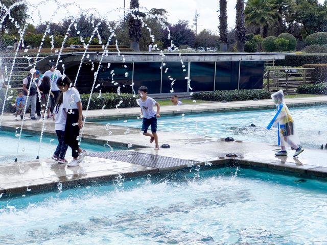 Children playing in a fountain 