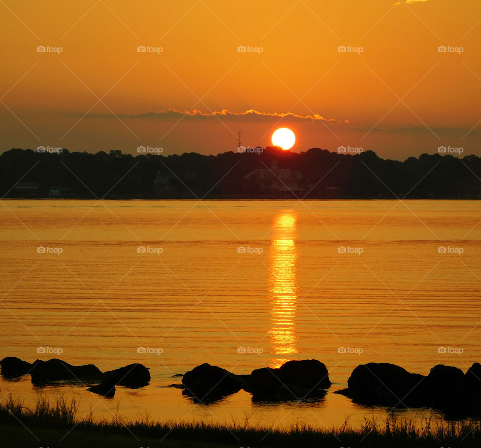Golden lake at sunset